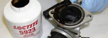 Loctite 5923 и фланец, покрытый герметиком